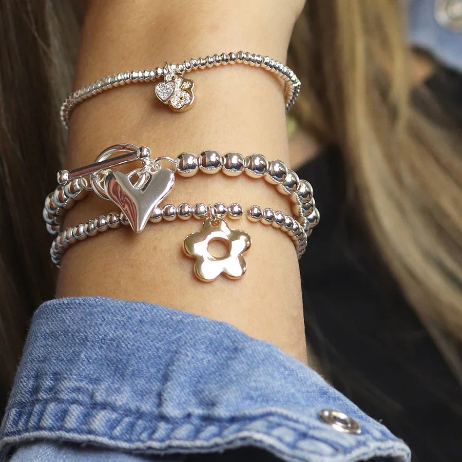 POM - Silver Plated & Faux Gold Retro Daisy Charm Bracelet