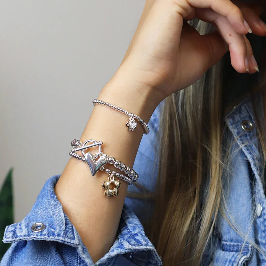 POM - Silver Plated & Faux Gold Retro Daisy Charm Bracelet