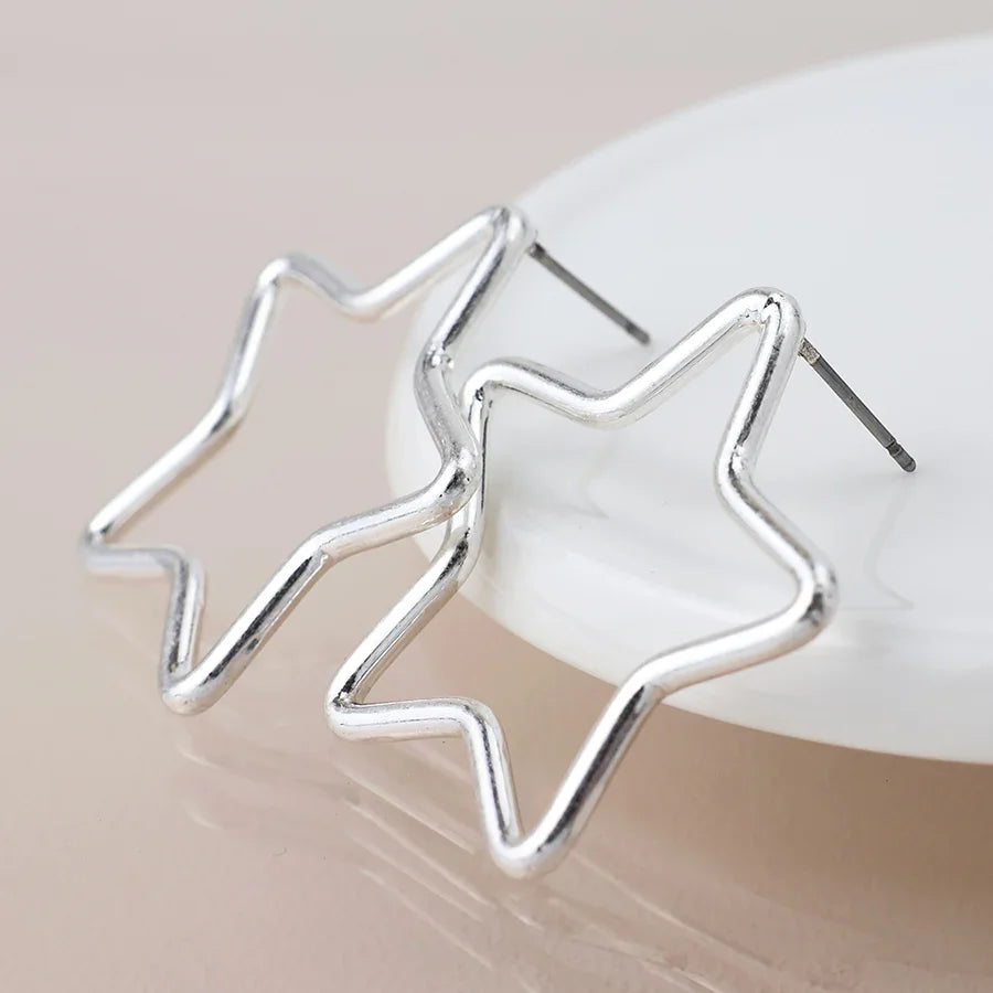 POM - Silver Plated Worn Open Star Earrings