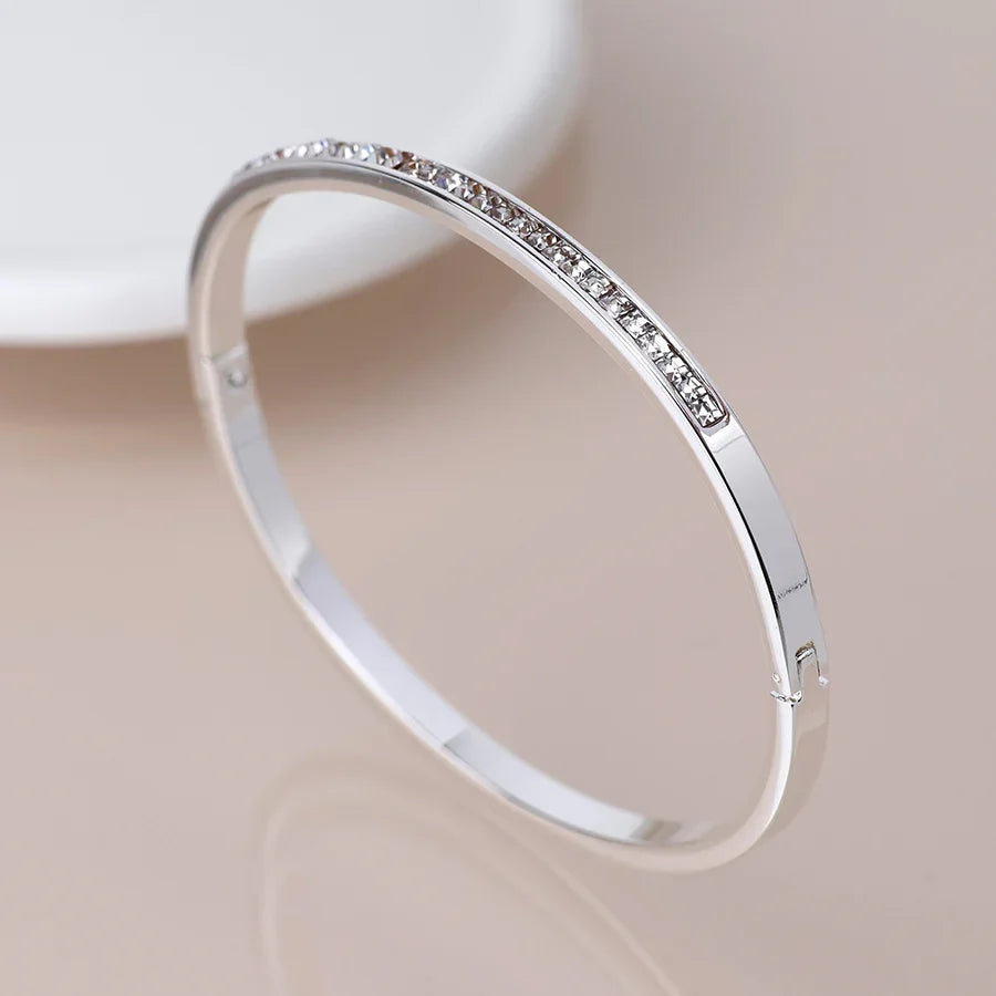 POM - Silver Plated Clear Crystals Hinged Bangle