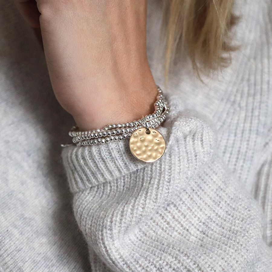 Silver plated triple strand bracelet with golden disc 03619