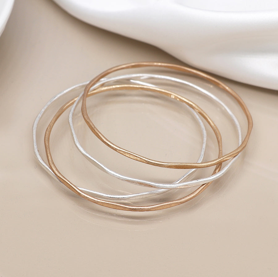 Silver Plated & Faux Gold Irregular Four Bangle Set with Worn Finish