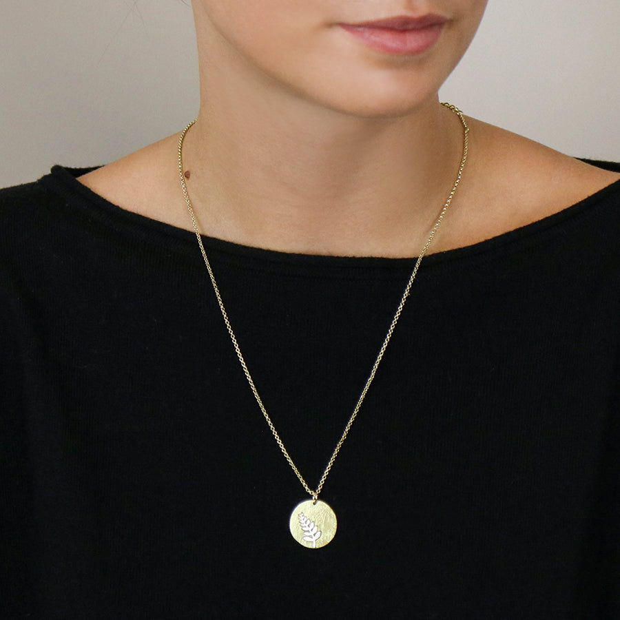 Faux Gold Scratched Disc Necklace with Silver Plated Fern Inlay