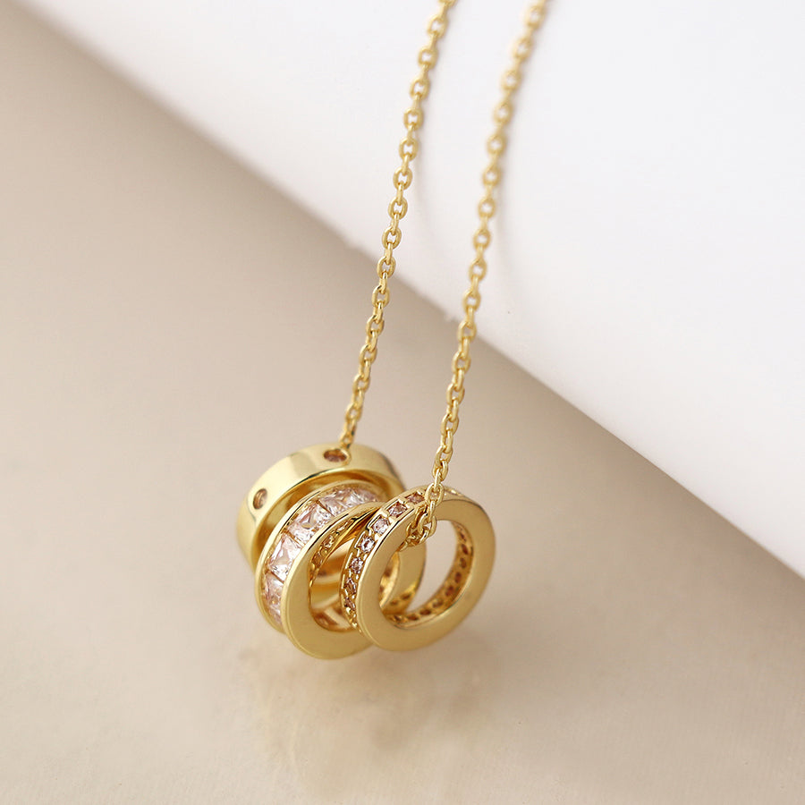 POM - Golden Triple Mini Crystal Rings Necklace