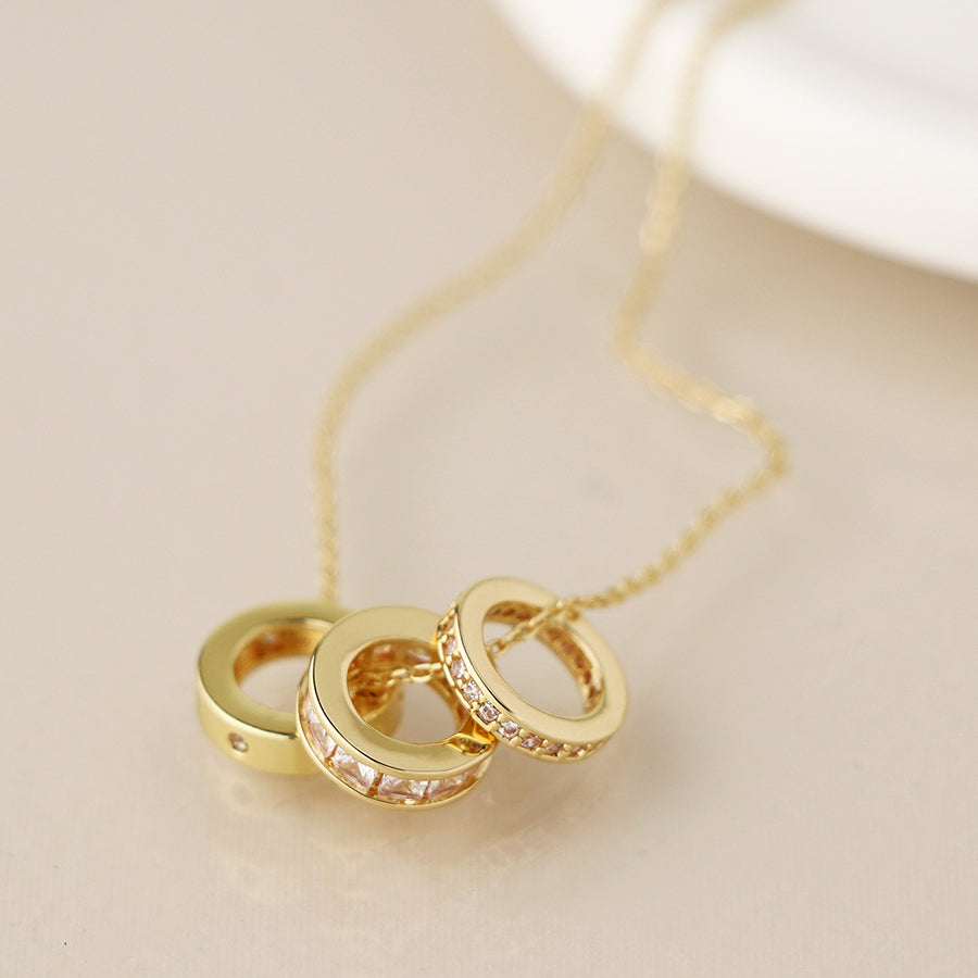 POM - Golden Triple Mini Crystal Rings Necklace