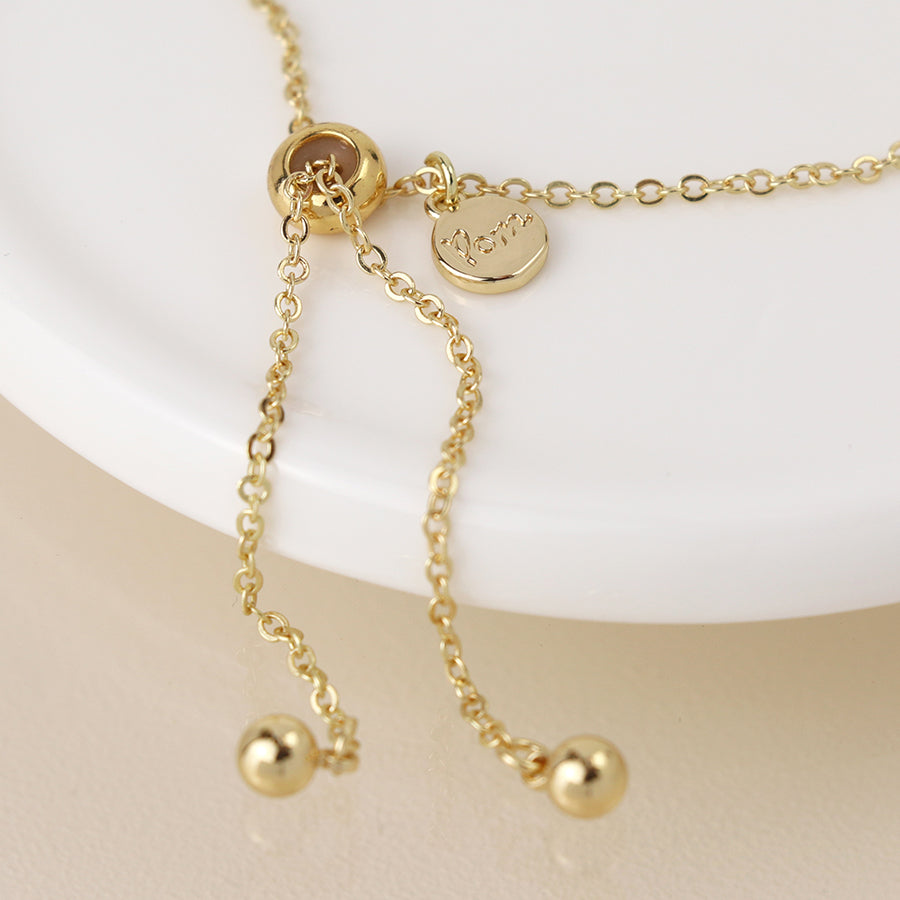 POM - Golden Crystal Cylinder Bracelet