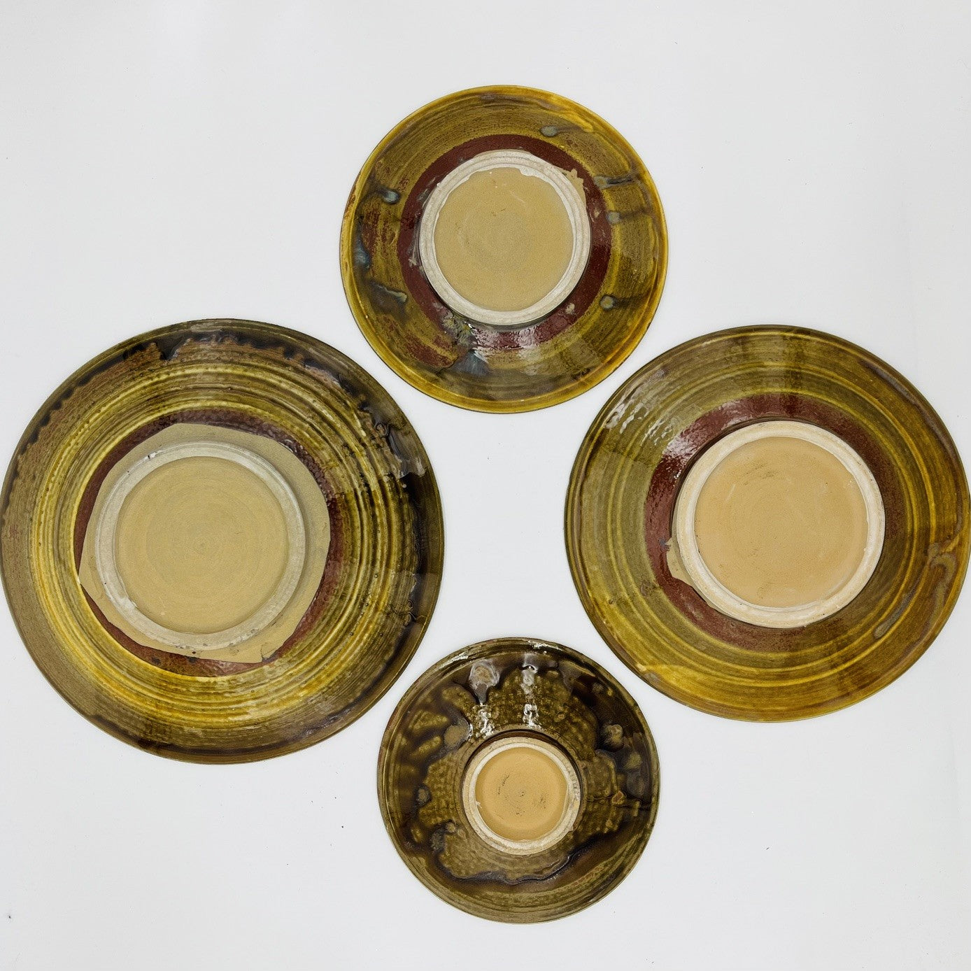 Studio Pottery Set of 4 Ammonite Design Stacking Footed Dishes