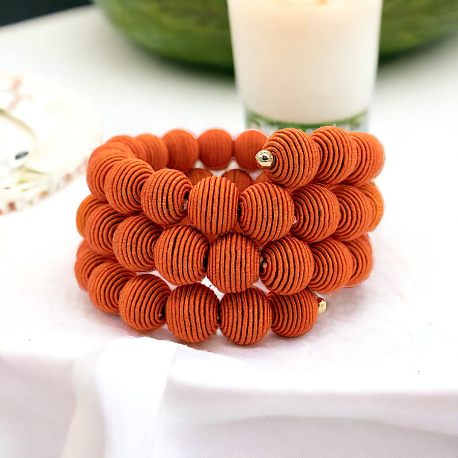 Coral Springwire Woven Ball Bracelet