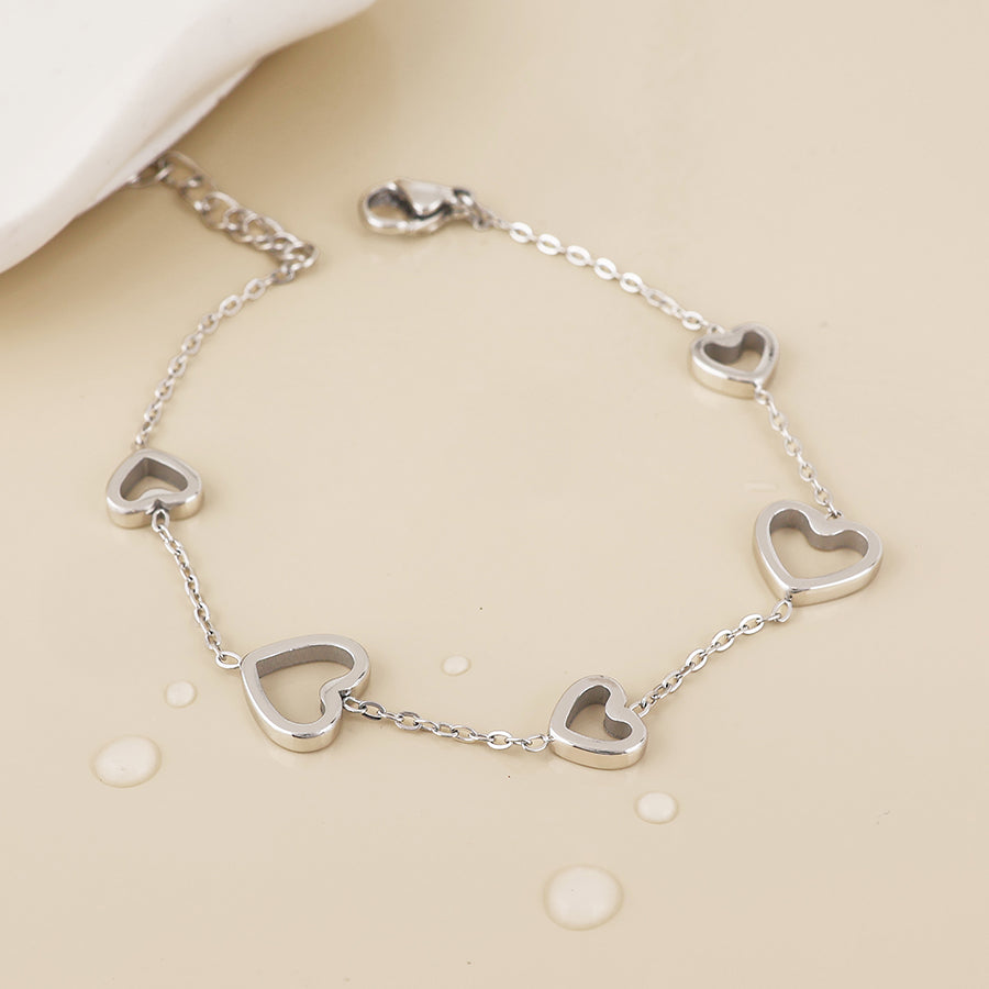 POM - Cupid Stainless Steel Platinum Plated Open Hearts Station Bracelet